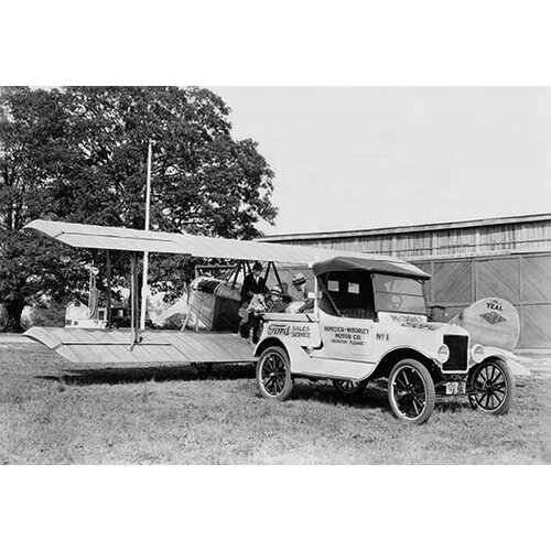 Ford Towing Plane Photographic Print by Buyenlarge